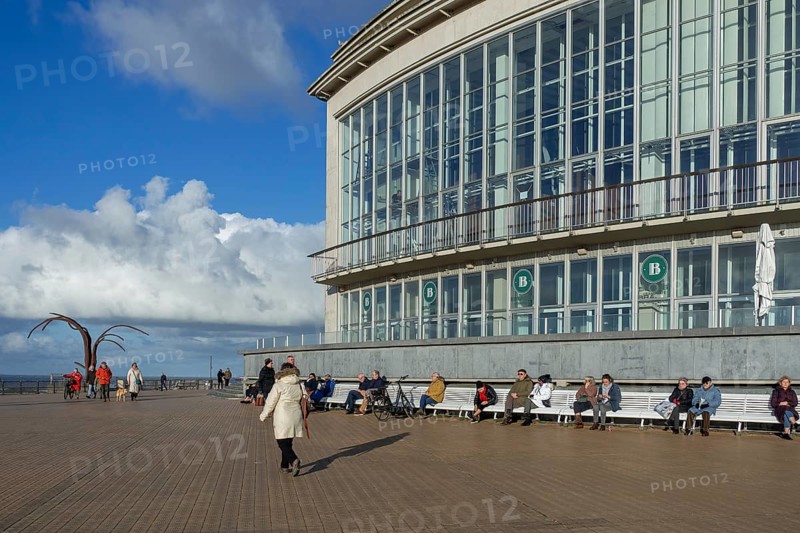 Casino-Kursaal and sculpture Dansende Golven, Dancing Waves on promenade in winter at seaside resort Ostend, Oostende, West Flanders, Belgium, Europe