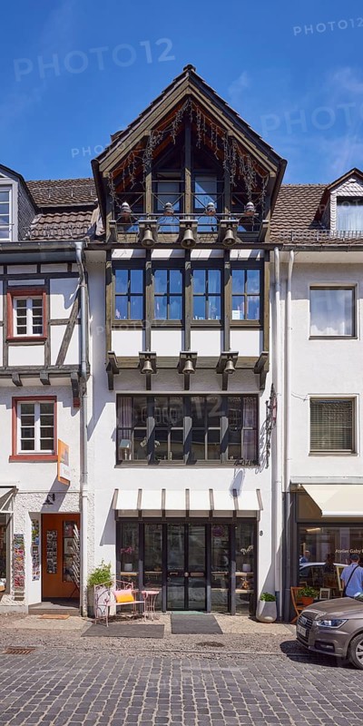 Bells on a house on Marktstraße in Bad Münstereifel, Eifel, Euskirchen district, North Rhine-Westphalia, Germany, Europe