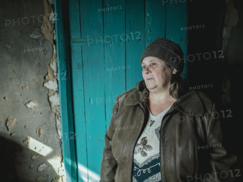 Larisa in her house in Borshchivka. The village was under Russian occupation. She hid with her granddaughter Angelina for almost six months in her house in Borshchivka, Raion Isyum, Kharkiv Oblast, Ukraine, Europe
