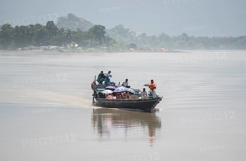 Morigaon, India. 4 July 2024. A boat carries a medical team in a flood affected village in Morigaon district in India's northeastern state of Assam on July 4, 2024. Torrential rains and surging rivers across northeast India have killed at least nine people, with more than 1.5 million people affected