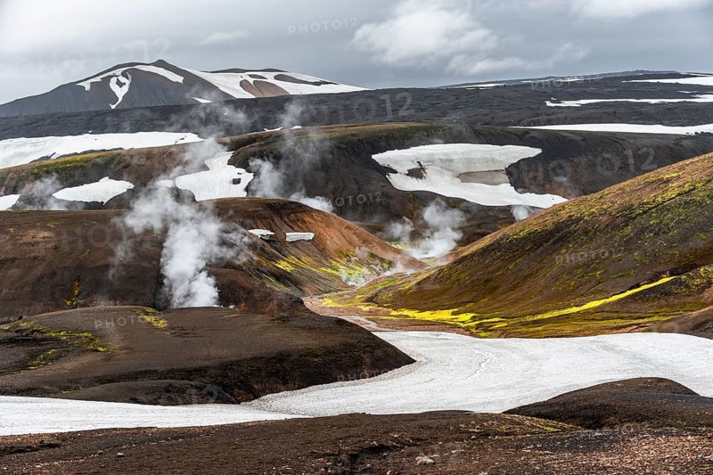 Colourful volcanic landscape with hills and snow, volcanic steaming hot springs, Laugavegur trekking trail, Landmannalaugar, Fjallabak Nature Reserve, Icelandic Highlands, Suðurland, Iceland, Europe