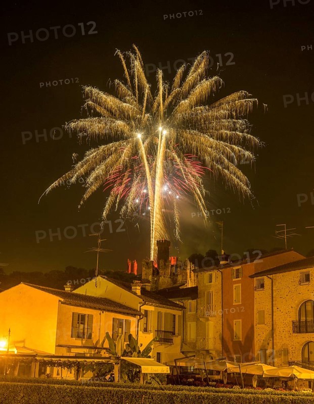 Fireworks from the Scaliger castle in the foreground Houses of, Borghetto, Valeggio sul Mincio, Province of Verona, Italy, Europe