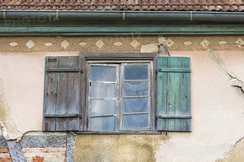 Old historic half-timbered house, windows, shutters, façade, in need of renovation, Swabian Alb, Baden-Württemberg, Germany, Europe