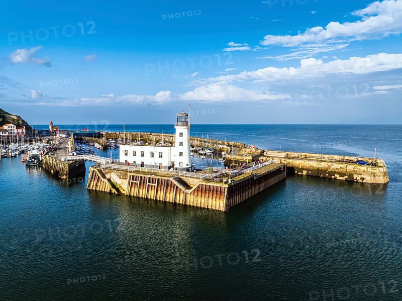 Scarborough Lighthouse and Harbour from a drone, Vincent Pier, Scarborough, North Yorkshire, England, United Kingdom, Europe