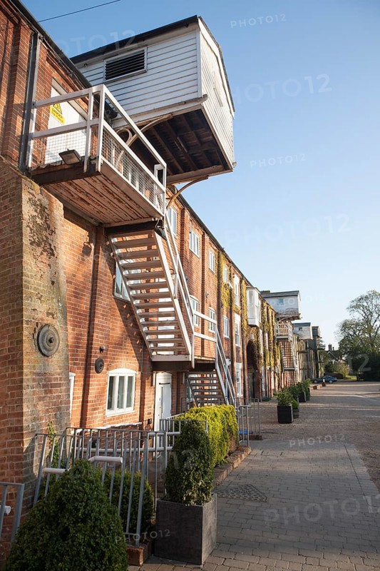 Nineteenth century industrial buildings converted into leisure, shopping, housing and cultural uses, Snape Maltings, Suffolk, England, United Kingdom, Europe
