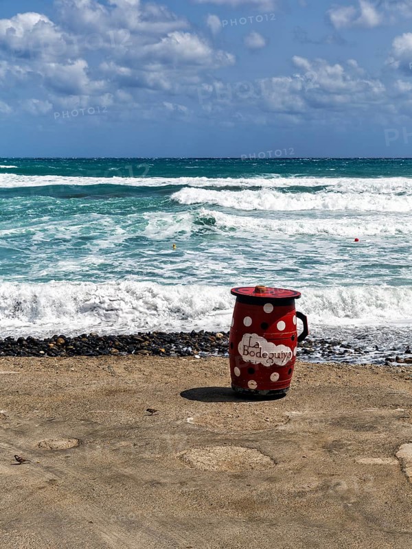 Red outdoor bar table, jug, bar with sea view, beach bar, Cabo de Gata Natural Park, Cabo-de-Gata-Nijar, Las Negras, Almeria, Andalusia, Spain, Europe