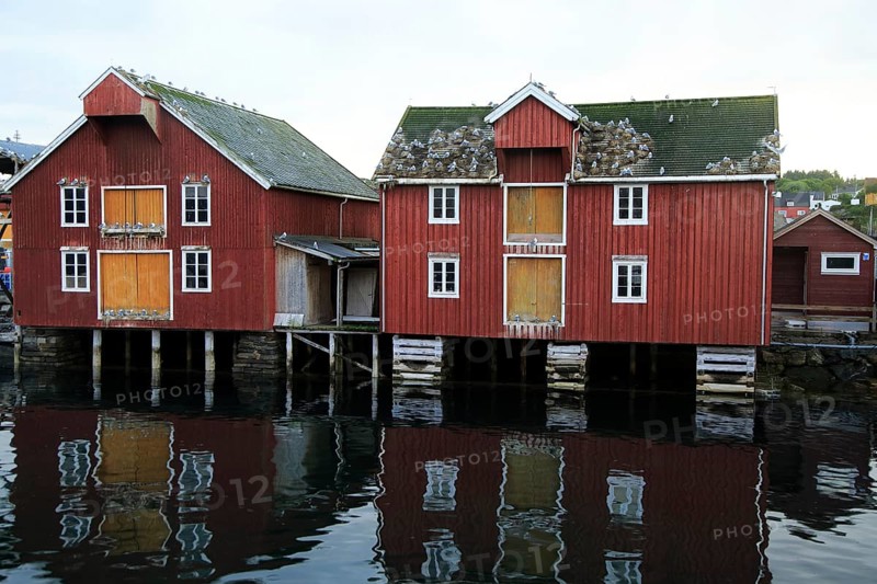 Traditional harbour buildings in fishing village of Rorvik, Norway, Europe