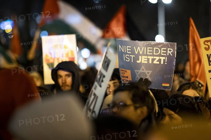 Pictures taken during the demonstration Auf die Strasse! Against Nazi deportation plans of the AfD in front of the Rotes Rathaus in Berlin, 17 January 2024. A sign with the inscription Nie Wieder ist jetzt!