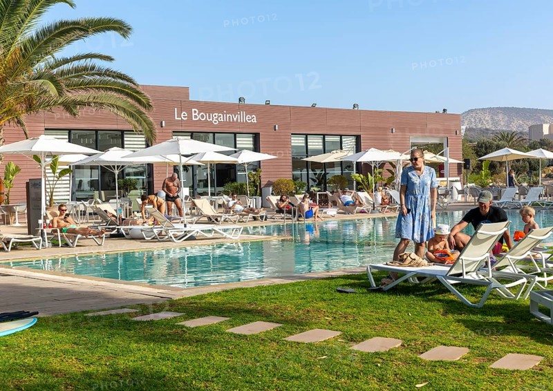 Tourists swimming pool, Radisson Blu Resort, Taghazout Bay Surf Village, Taghazout, Morocco, North Africa, Africa