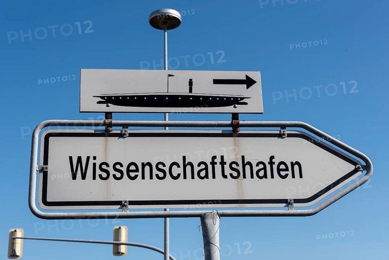 Sign pointing the way to Magdeburg Science Harbour, Saxony-Anhalt, Germany, Europe