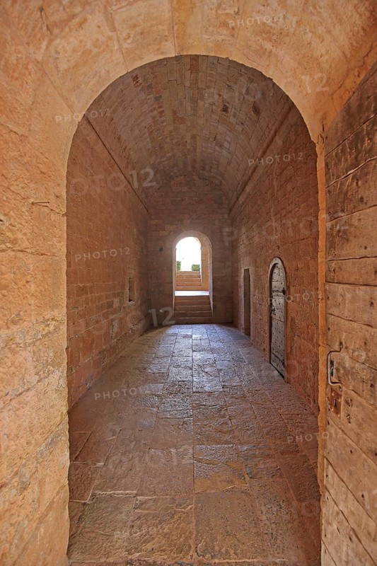 Interior view of the corridor of the Romanesque abbey Le Thoronet, archway, door, open, passage, monastery complex, Cistercian abbey, Var, Provence, France, Europe
