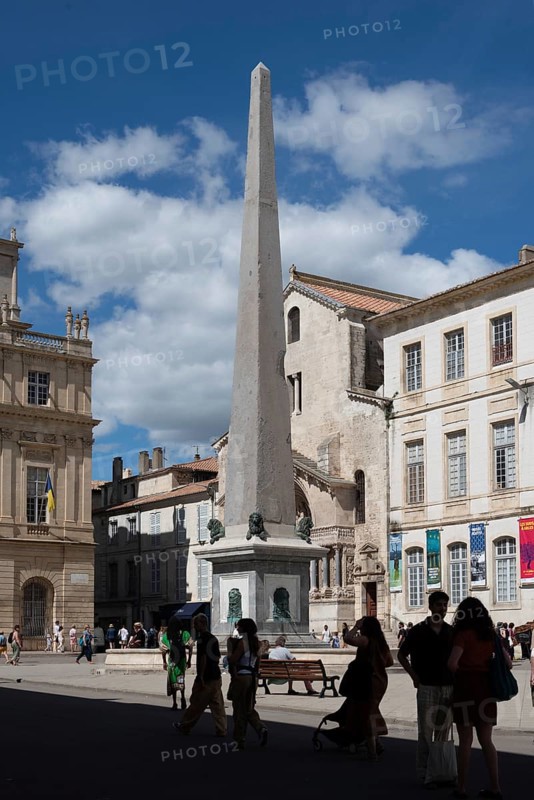 An obelisk stands on the Place de la Republique in Arles, Arles, Provence-Alpes-Côte d'Azur, France, Europe