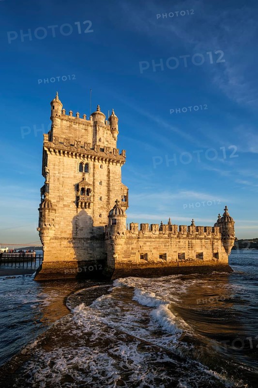 Belem Tower or Tower of St Vincent, famous tourist landmark of Lisboa and tourism attraction, on the bank of the Tagus River Tejo on sunset. Lisbon, Portugal, Europe