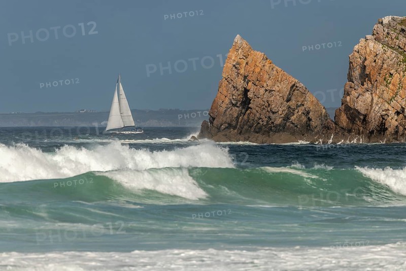 Sailboat sailing offshore on the Atlantic Ocean. Camaret sur mer, Crozon, Finistere, Brittany, France, Europe
