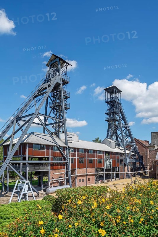 Two colliery headframes and coal mine buildings at Le Bois du Cazier, coal mining museum at Marcinelle near Charleroi, province of Hainaut, Belgium, Europe
