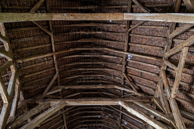 Interior showing wooden truss of 13th century Gothic monastic tithe barn of the Ter Doest Abbey at Lissewege near Bruges, West Flanders, Belgium, Europe