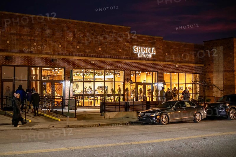 Detroit, Michigan - People shop for luxury watches and other items at the Shinola Detroit store on Noel Night. The annual Noel Night at the start of the holiday season in Detroit features open houses by arts and cultural institutions, churches, and small businesses.