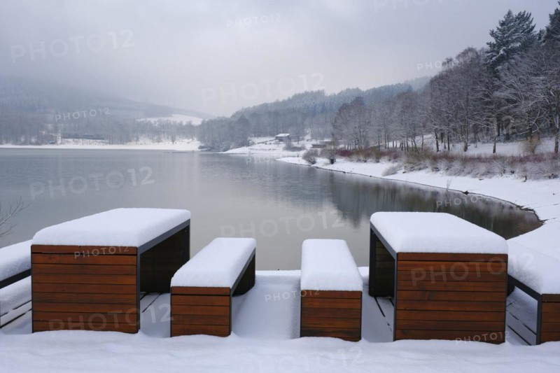 Rest area with snow-covered benches at the Hennesee, Hennetalsperre, Naturpark Sauerland-Rothaargebirge, Meschede, Sauerland, North Rhine-Westphalia, Germany, Europe