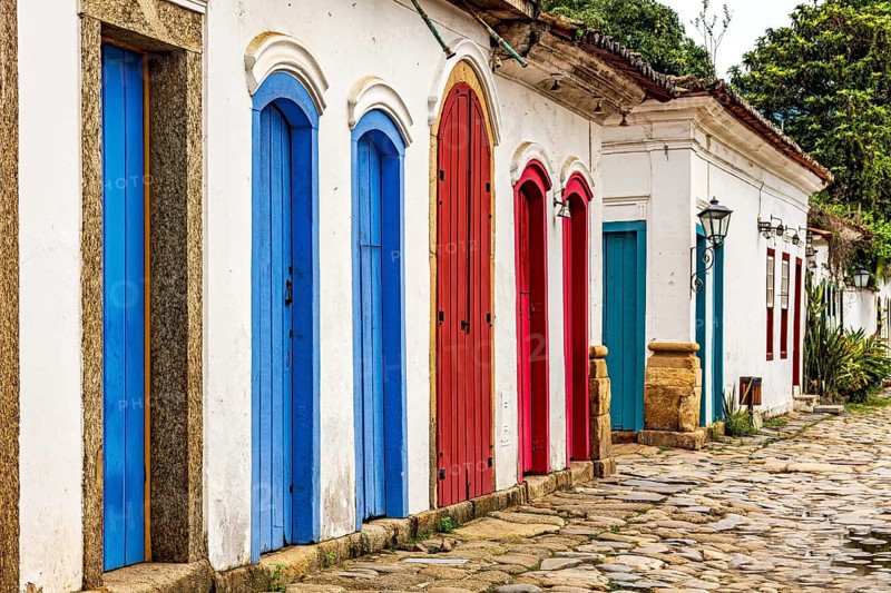 Facade of old houses in colonial architecture with their colorful doors, Paraty, Rio de Janeiro, Brazil, South America