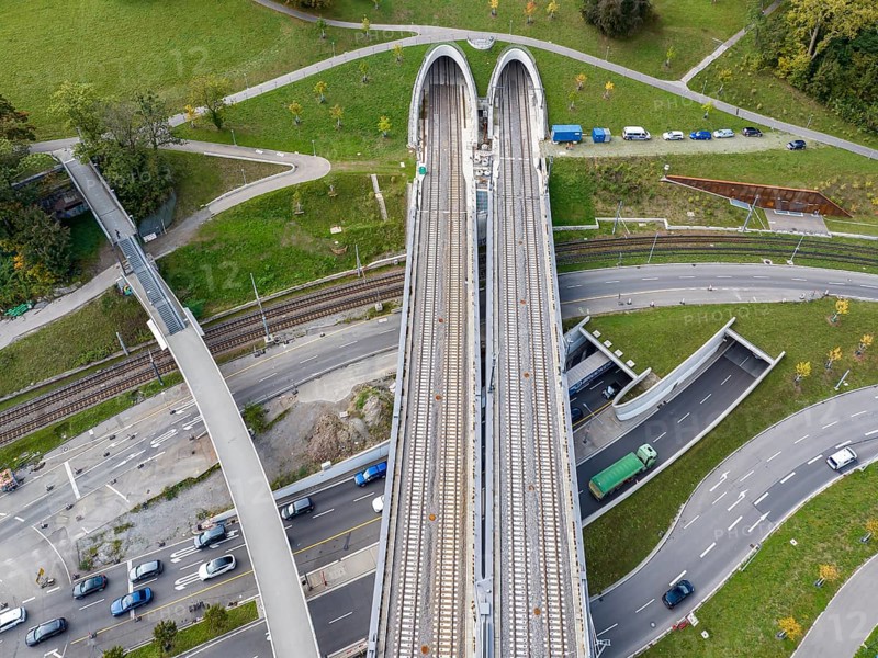Deutsche Bahn AG's new Neckar Bridge, part of the Stuttgart 21 project. The tracks lead into the Rosenstein Tunnel through Rosenstein Park. Below is the portal of the Rosenstein Tunnel for road traffic. Aerial view. Stuttgart, Baden-Württemberg, Germany, Europe