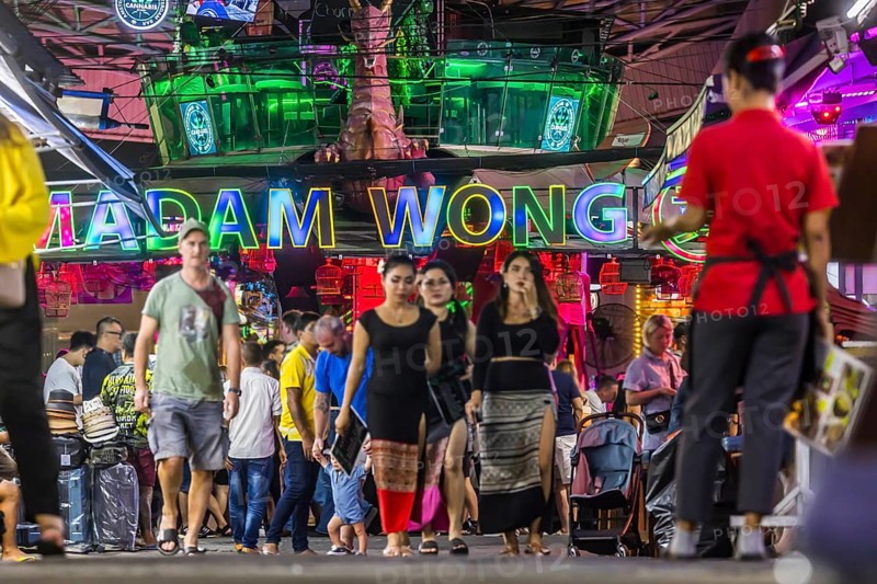 Crowds of people on Bangla Street in the evening. Nightlife on Bangla Walking Street with go-go bars, clubs, cannabis bars and extreme loudness. Patong, Kathu, Phuket Island, Thailand, Asia