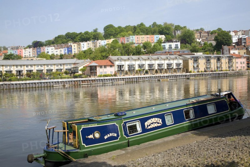 Colourful houses on hillside Clifton, Hotwells, from Floating Harbour, River Avon, Bristol, England, UK