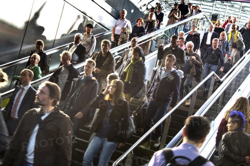 Deutsche Bahn passengers on an escalator at Berlin Central Station, 26/09/2016