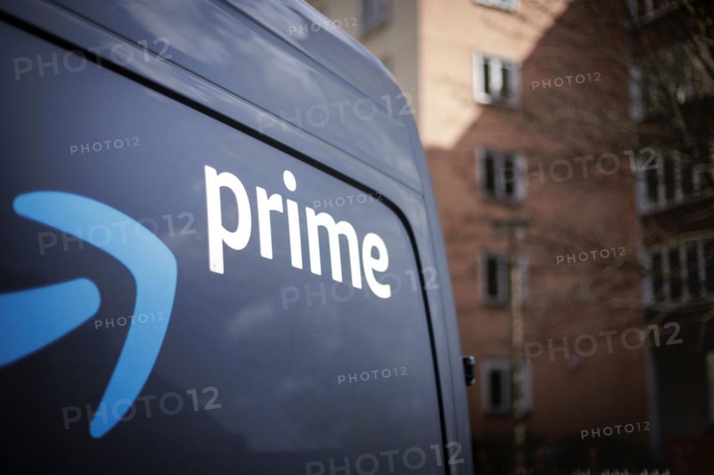 A detail of a trolley labelled prime from the online mail order company Amazon prime in a housing estate. Berlin, 28.03.2024