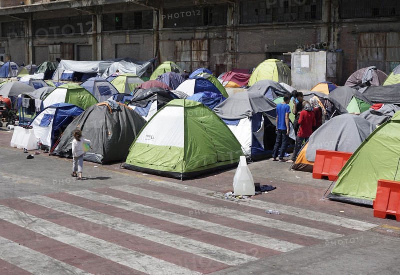 Refugees on 13.04.2016 in a camp in the port of Piraeus, Greece, Europe