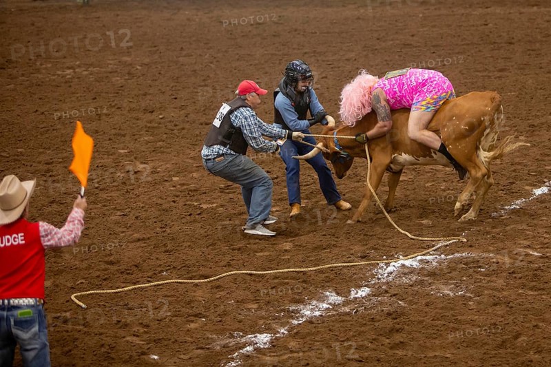 Oklahoma City, Oklahoma, The Great Plains Rodeo, an annual gay rodeo that features traditional rodeo competition while emphasizing the camaraderie of the LGBTQ community. In Wild Drag Racing three people must pull a steer across a while line and then the competitor in drag must ride it back across the line