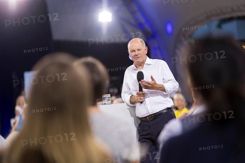 Olaf Scholz (Chancellor of the Federal Republic of Germany, SPD) surrounded by guests at the Chancellor's meeting at ufaFabrik in Berlin on 4 September 2024