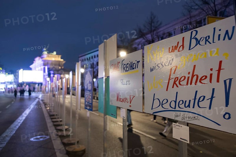 Signs painted by children with the inscription Without freedom everything is nothing and Kyiv and Berlin know exactly what freedom means! on the 35th anniversary of the fall of the Berlin Wall, 8 November 2024