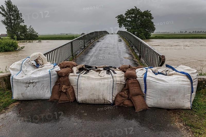 Sandbags in front of a bridge, high water, flooding, climate change, Whitsun floods 2013, Schlehdorf, Bavaria, Germany, Europe