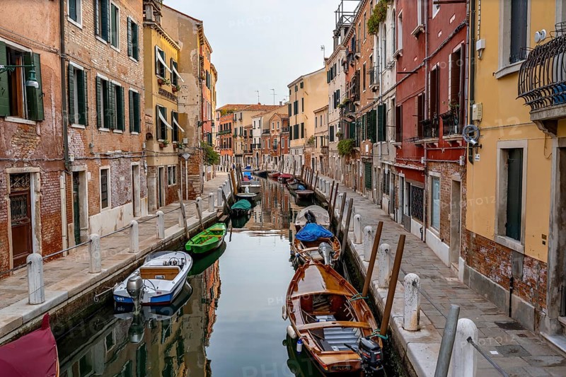 Motorboats and colourful house facades on a small canal, Venice, Veneto, Italy, Europe