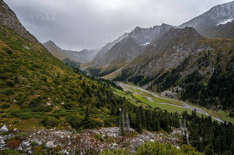 Green mountain valley with river and steep mountain peaks, Chong Kyzyl Suu Valley, Terskey Ala Too, Tien-Shan Mountains, Kyrgyzstan, Asia