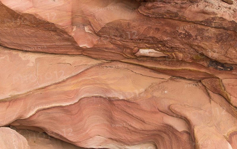 Natural texture of red rocks. Colored canyon, Egypt, desert, the Sinai Peninsula, Nuweiba, Dahab, Africa