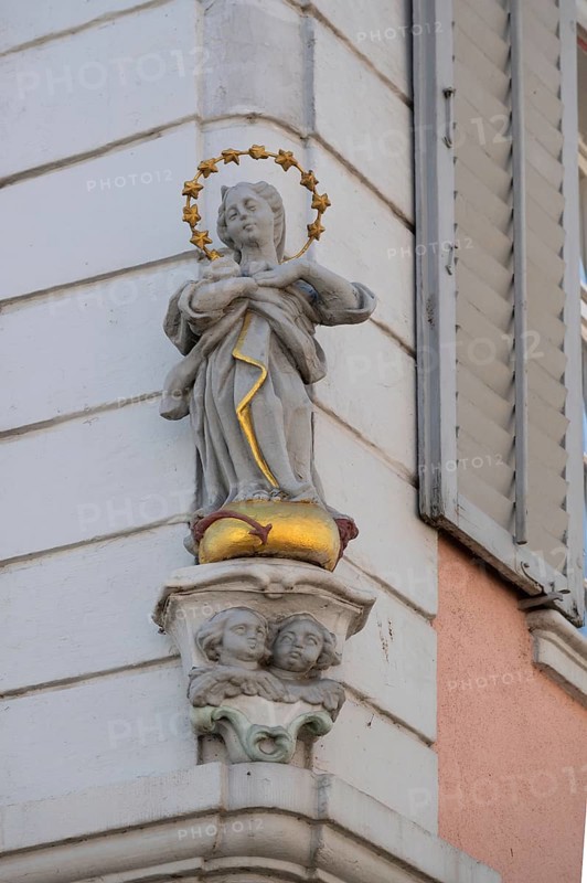 Sculpture of the Virgin Mary on a corner house, Endingen, Baden-Württemberg, Germany, Europe