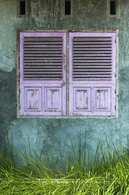 Dilapidated wall with shutter as texture, window, closed, flaked, pastel, pastel, colour mood, architecture, house, house wall, facade, wall, real estate crisis, crisis, bankruptcy, economic crisis, art, retro, vintage, graphic, graphic, structure, rustic, building materials, construction industry, construction crisis, old, historical, Indonesia, Asia