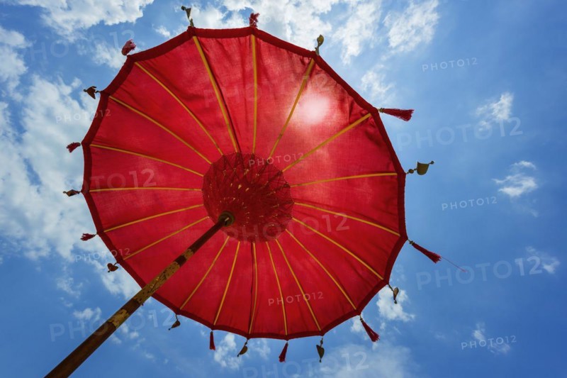 Traditional Balinese temple sunshade as parasol, Hinduism, symbol, beach holiday, protection, sun protection, Balinese, culture, red, yellow, sun, relaxation, relax, blue sky, cliché, holiday cliché, holiday feeling, holiday mood, spa, relax, chill out, shade, shade dispenser, decorated, summer, long-distance travel, exotic, holiday idyll, paradisiacal, water, sea, ocean, coast, travel, holiday, tourism, sea view, Asian, Bali, Indonesia, Asia