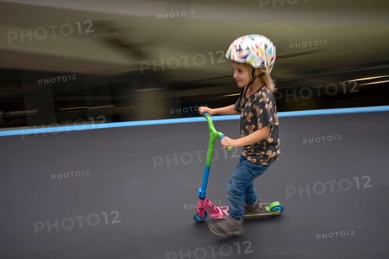 Little boy, 5 years, blond, helmet, helmet, riding on scooter, scooter, skater track, playground, movement effect, speed, Stuttgart, Baden-Württemberg, Germany, Europe