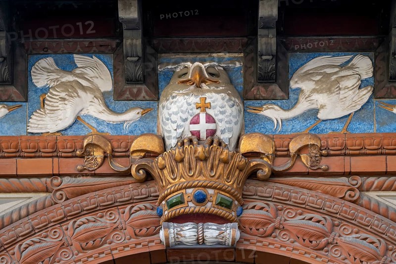 Detail, historic façade with decorative bird reliefs and owl on Danish crown, Carlsberg Museum, Carlsbergbygen, Carlsberg Quarter, Valby, Copenhagen, Denmark, Europe