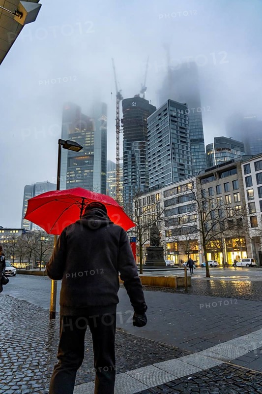 Rainy weather, freezing rain, Goetheplatz, high-rise skyline in clouds, passers-by hurrying through the damp, icy weather, Frankfurt am Main, Hesse, Germany, Europe