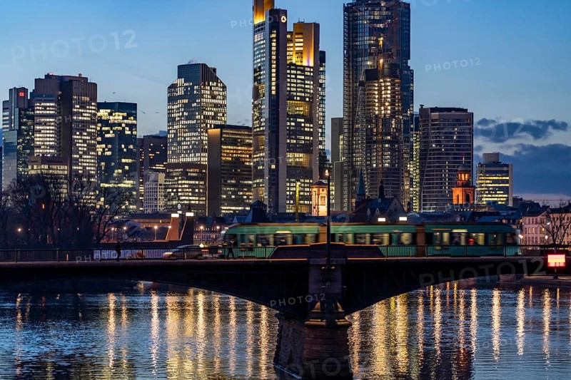 Skyline of the city centre of Frankfurt am Main, river Main, dusk, Ignatz-Bubis-Brücke, Hesse, Germany, Europe