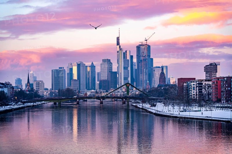 The skyline of Frankfurt am Main, skyscrapers of the banking district, Flößerbrücke, wintry morning, Hesse, Germany, Europe