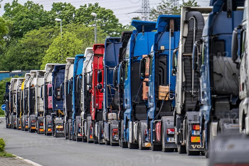 Truck tractors, exclusively from Eastern European countries, park in the harbour area, the canal port of Herne, the drivers wait for the next transport operation, spend their rest periods there, North Rhine-Westphalia, Germany, Europe