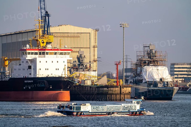 Port of Hamburg, Blohm + Voss shipyard, dredger OSTERIFF and corvette of the German Navy, Karlsruhe, F267, under construction, harbour tour launch, Hamburg, Germany, Europe