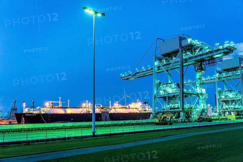 EemsEnergyTerminal, floating LNG terminal in the seaport of Eemshaven, tankers bring liquefied natural gas to the two production ships, Eemshaven LNG and Golar Igloo, which thaw the liquefied gas and feed it into the normal natural gas grid, in operation since September 2022, harbour cranes, Netherlands