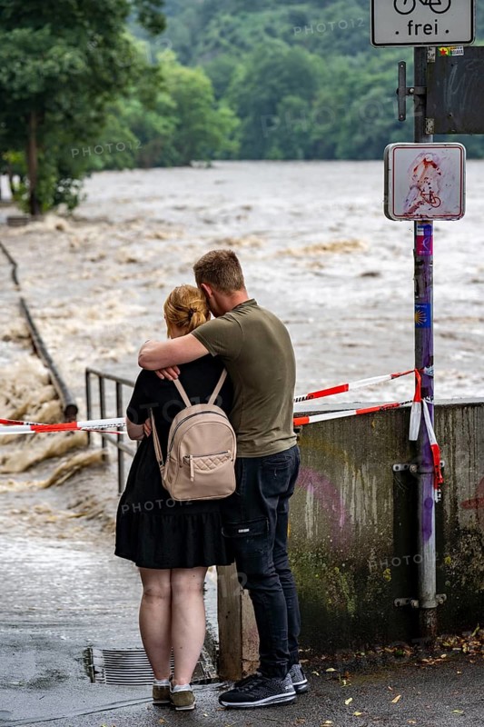 Weir of the Lake Baldeney in Essen, the masses of water roar through the open weirs, spectators, onlookers, high water on the Ruhr, after long heavy rains the river came out of its bed and flooded the landscape and villages, the highest water level ever measured, North Rhine-Westphalia, Germany, Europe