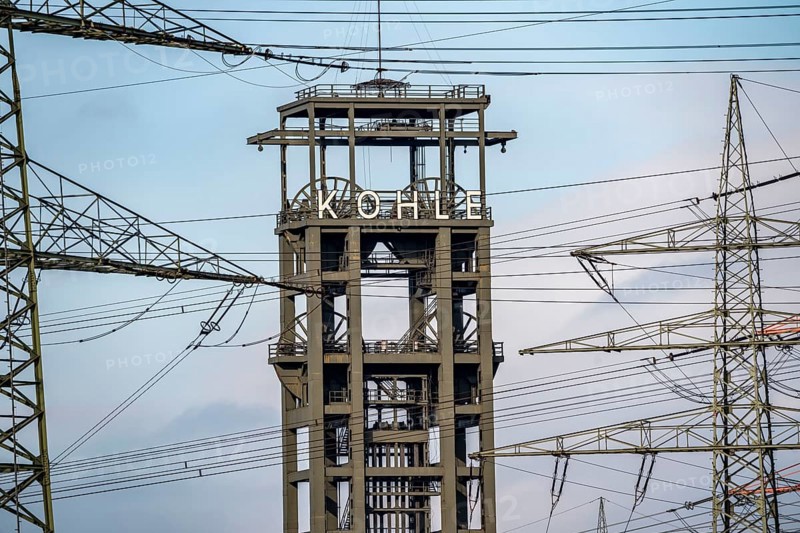 Headframe of the former, disused Walsum colliery, electricity pylons of the STEAG coal-fired power station Duisburg Walsum, on the Rhine, Duisburg, North Rhine-Westphalia, Germany, Europe