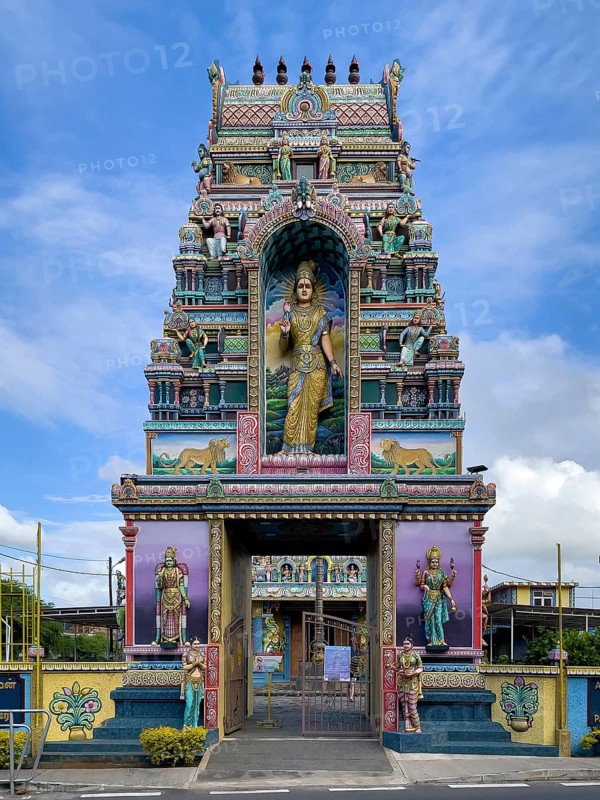 Portal tower with statues of deities Statues of deities at the entrance to Hindu temple Shri Sri Draupadi Amman Kovil Temple, Cap Malheureux, Mauritius, Africa
